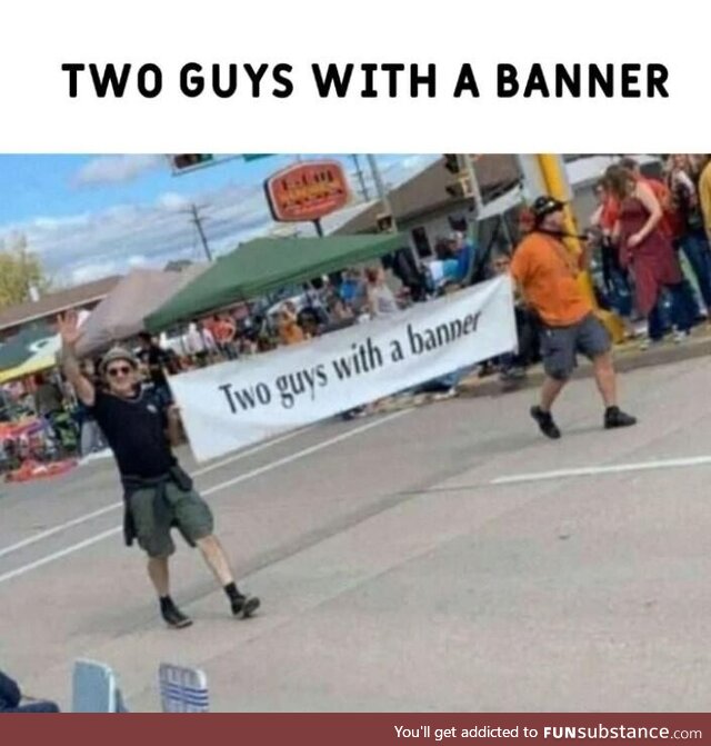 Two guys with a banner
