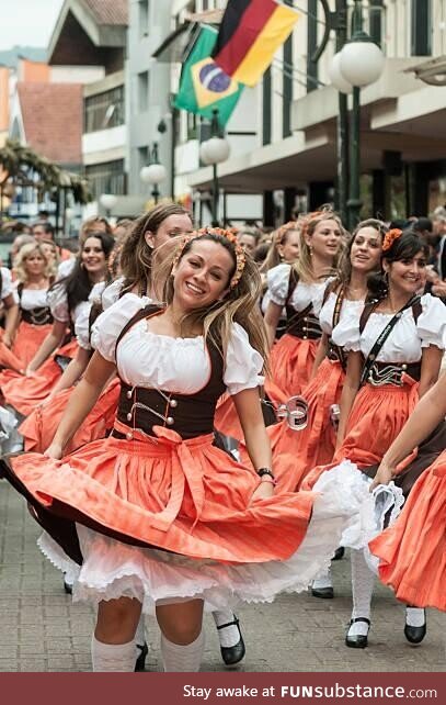 Women dancing at Oktoberfest in Blumenau, a city in Brazil founded by german settlers in