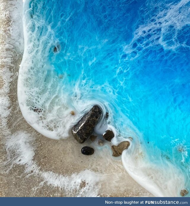 Ocean artwork made with resin, rocks and sand