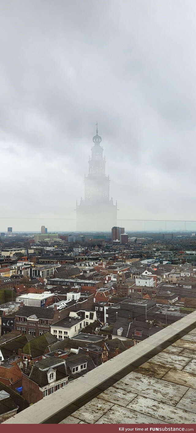 The reflection of this tower looks like it's a huge castle in the distance