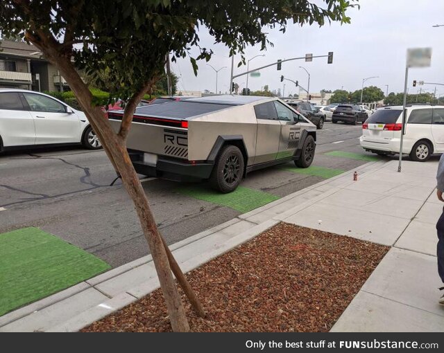 Near a Tesla factory. A driving cybertruck
