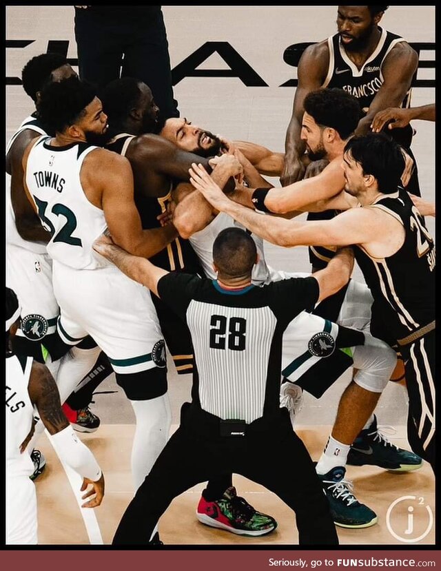NBA player Draymond holding Rudy in a chokehold in a wild scuffle during a game