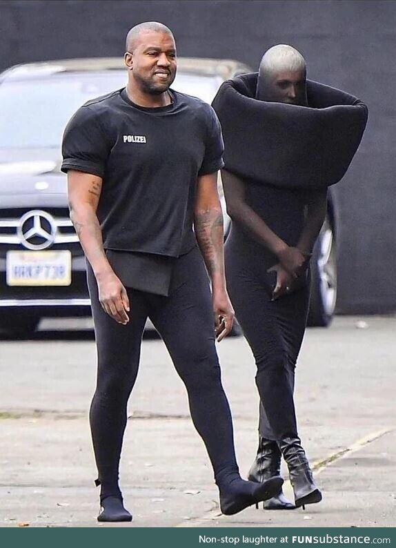 Kanye and his new wife out for a stroll