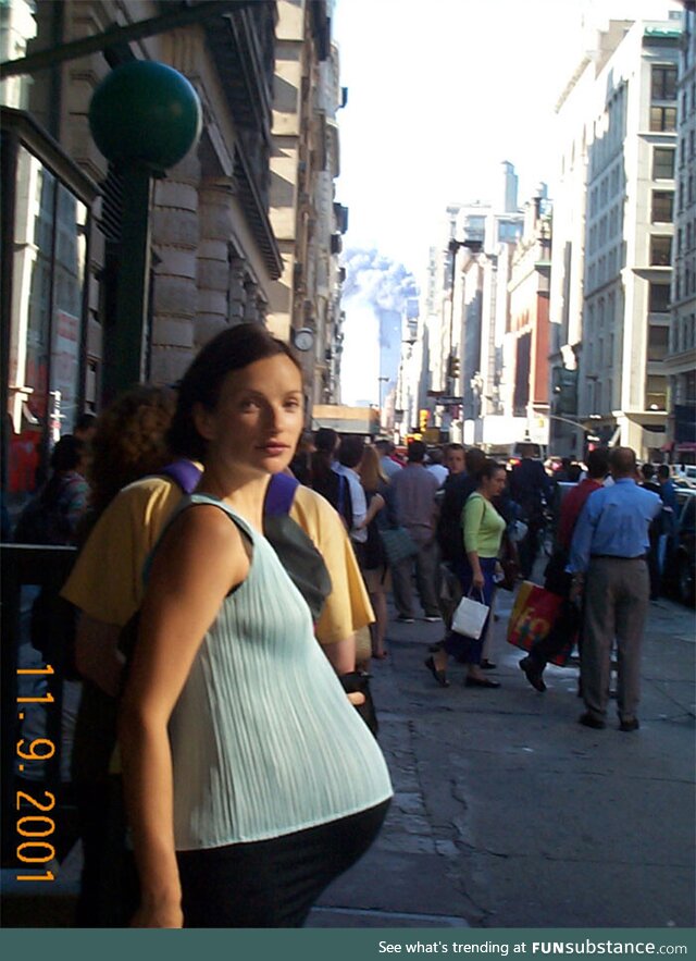 A pregnant woman not yet realizing a terrorist attack was In progress