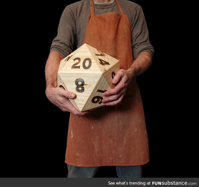 A Giant D20 branded with hot irons