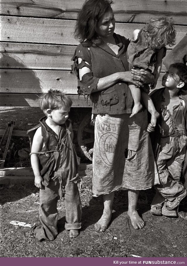 Mother and children living in field near the Tennessee River, March 1936