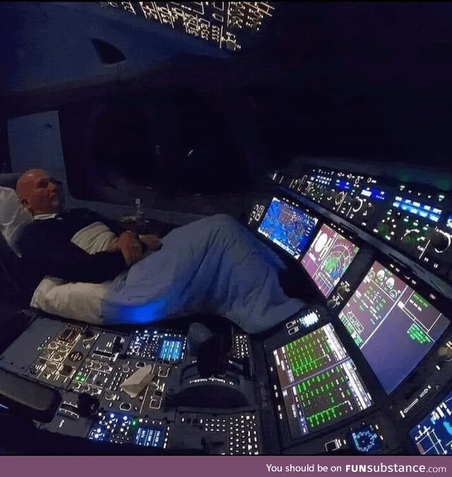 A pilot relaxing in a “controlled rest” during an overnight flight