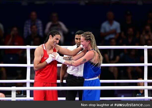 Algerian boxer Imane Khelif shakes hands with her opponent who called her a demon