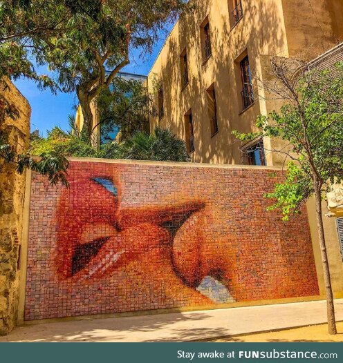 The World Begins With Every Kiss photo mosaic mural built from "freedom moments"