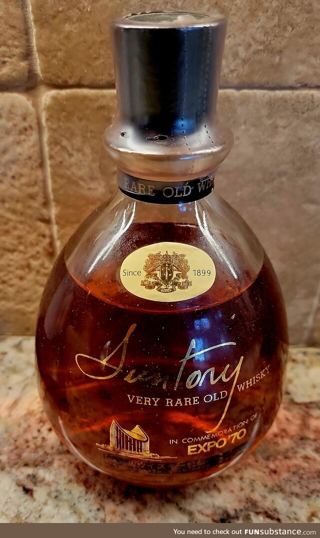 Found during a move. Suntory Whiskey that's bottle-aged 54 years