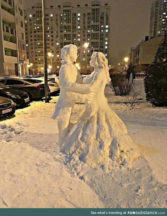 Someone made this beautiful snow couple