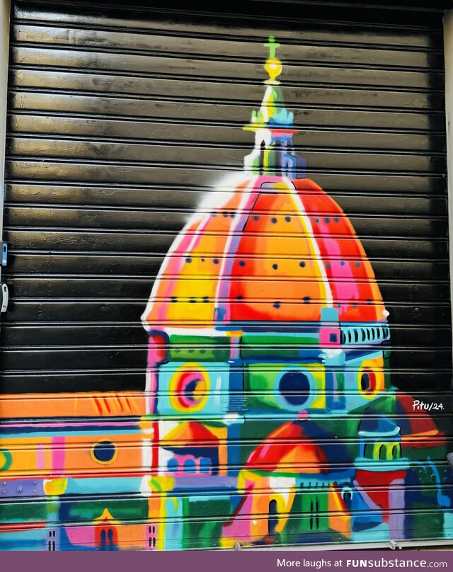 Beautiful graffiti spotted on a closed shop in the streets of Florenze