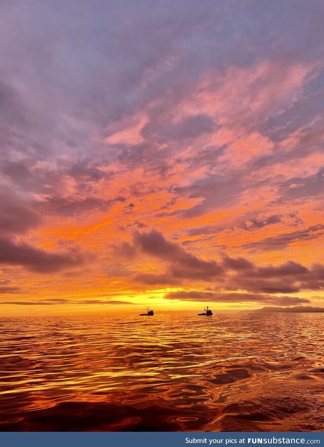 Sunrise on a salmon fishing boat of the cost of southern Kodiak Alaska shot at 5:00am
