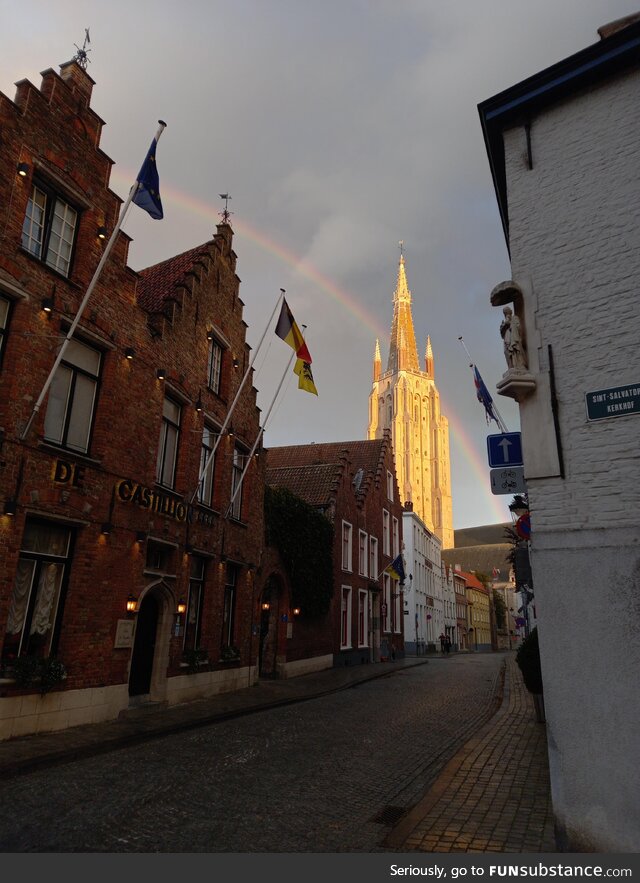 A Bruges' church with a rainbow behind it!