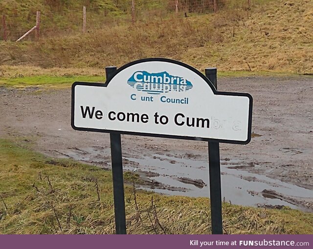 Vandalised road sign