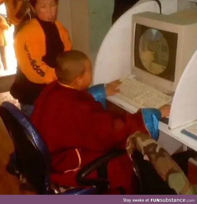 Mongolian Buddhist monk playing Counter Strike in early 2000s