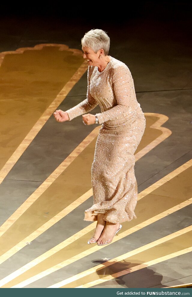 Jamie Lee Curtis celebrating EEAAO's best picture win at the Oscars