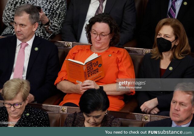 Katie Porter reading a book