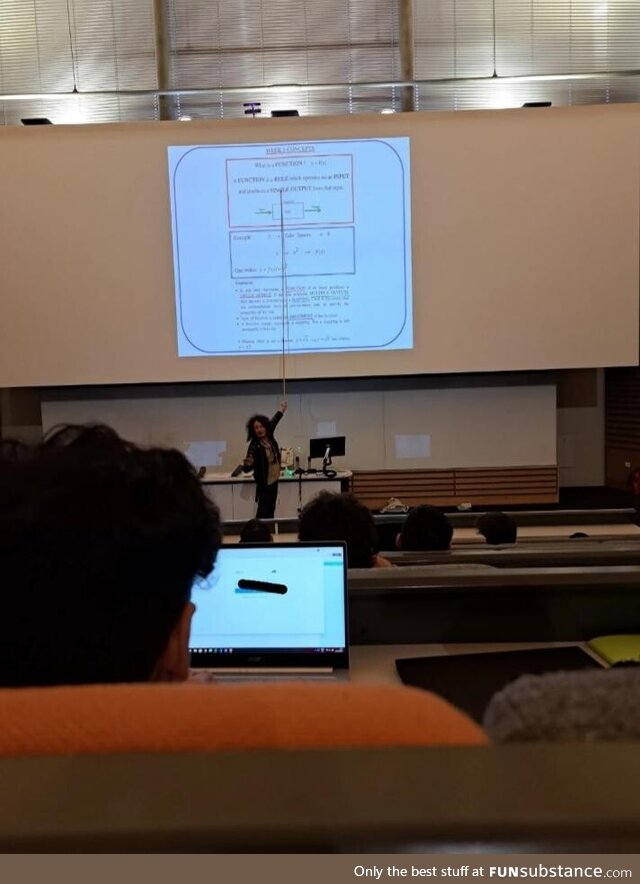 Lecturer with giga long stick