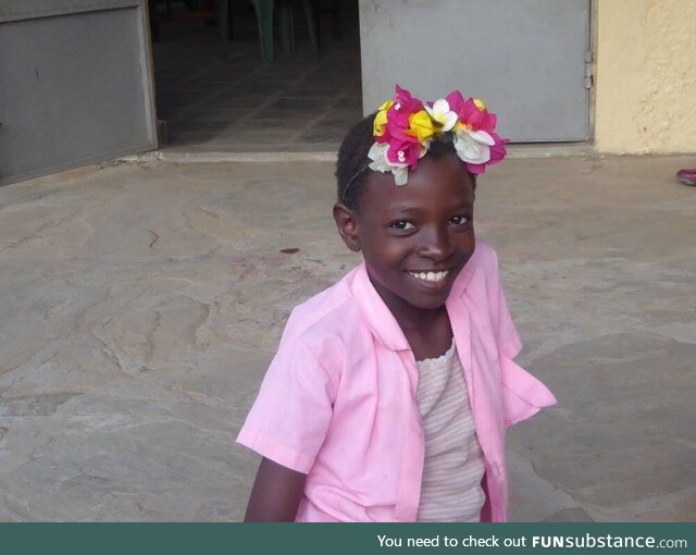 A little girl I met in Kenya in 2016, wearing a fresh-picked flower crown that she made
