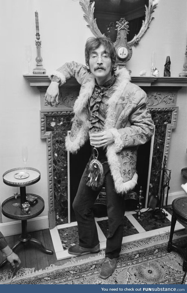 John Lennon sporting an Afghan coat and a sporran (the hairy thing dangling from his