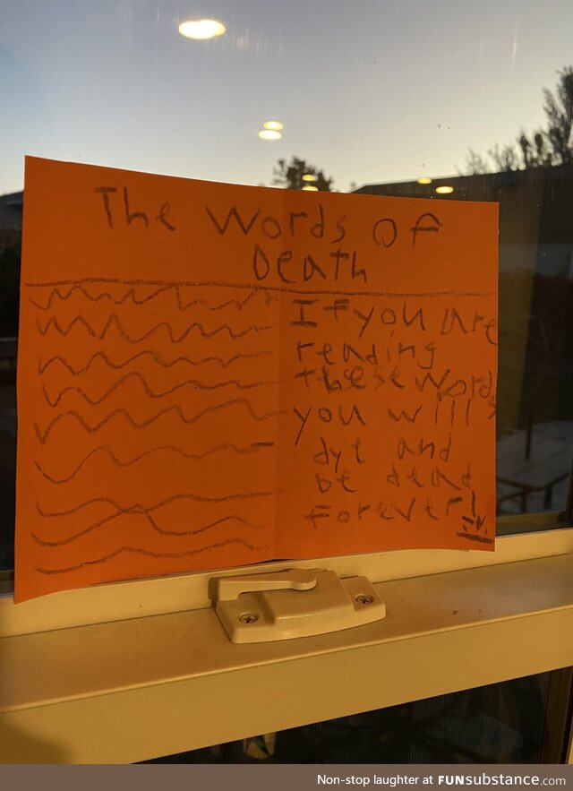 Our 8 year old made Halloween decorations this morning and we just noticed this one she