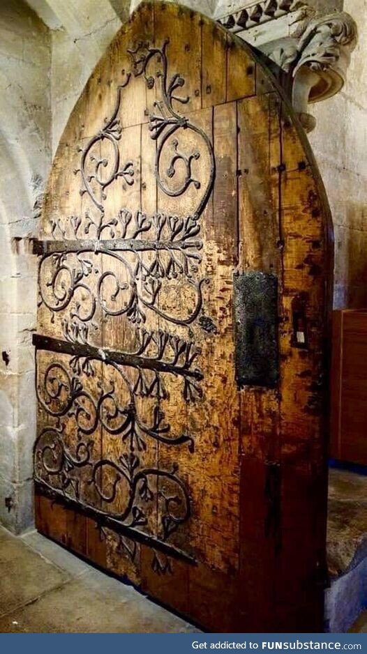 A 12th century door at Wells Cathedral in Somerset, England, UK