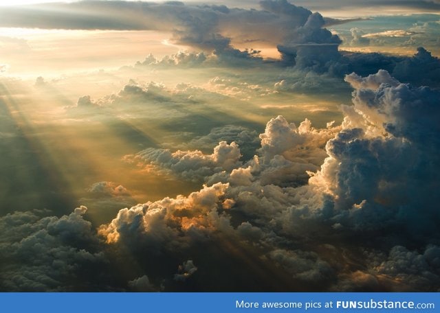 Awesome sunset over the clouds
