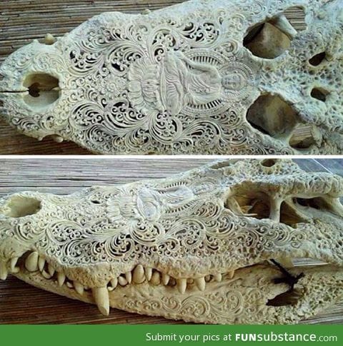 Carved alligator skull