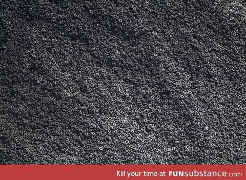 Aerial view of a scrap tire dumpyard