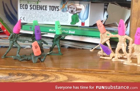 Kid took his army guys and made them...Happy