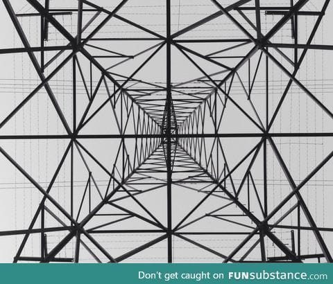 What it looks like to stand directly underneath an electrical tower