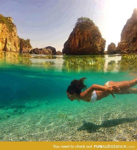 Crystal clear water in La Grotta Cove, Corfu Island, Greece..Amazing :O