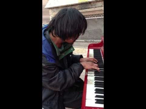 Homeless man who lived on the streets plays a beautiful piano melody that he wrote