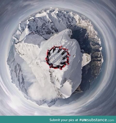 Drone-selfie of climbers on the summit of the Matterhorn