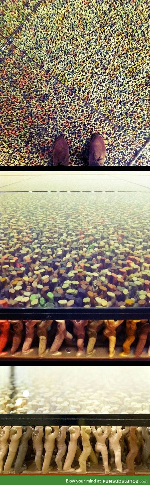 This glass floor is being held up by thousands of plastic toy figures