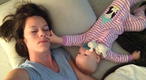 This mom tries to sleep with her baby, but the baby has other plans