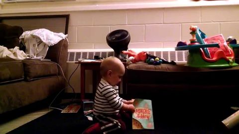 Adorable baby loves dancing to his musical birthday card