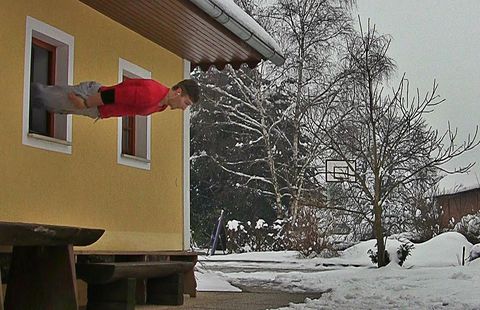 Guy demonstrates amazing window jumps