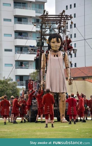 Giant little-girl marionette