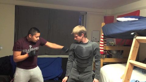 Home made Batman suit blocks multiple punches