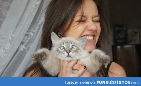 That's a 'put me down' face if I've ever seen one