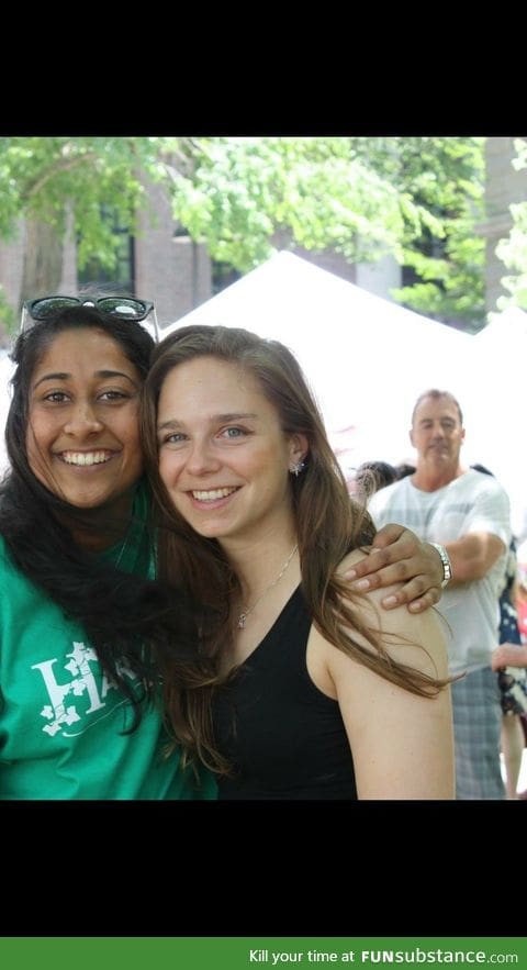 The man in the back of his picture looks like his hand is on the girl's shoulder