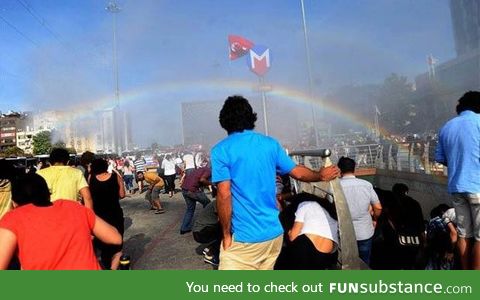 Police in Turkey try to stop Pride parade with water cannons, accidentally creates rainbow