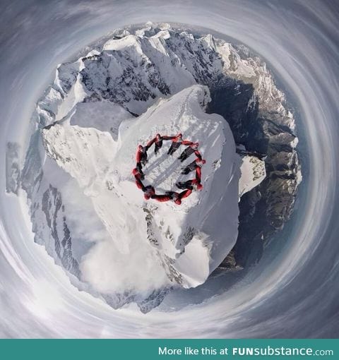 Drone-selfie of climbers on the summit of the Matterhorn