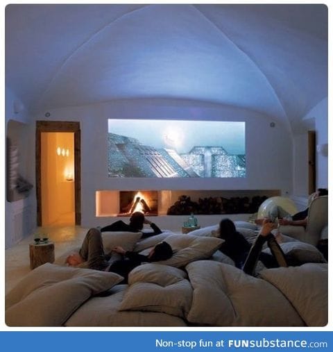 Stylish home theatre. Seriously... Who wouldn't love this?!