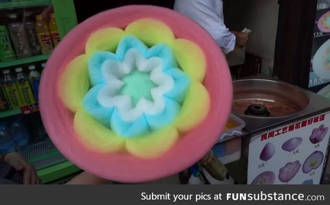 Cotton candy vender is really good at his job