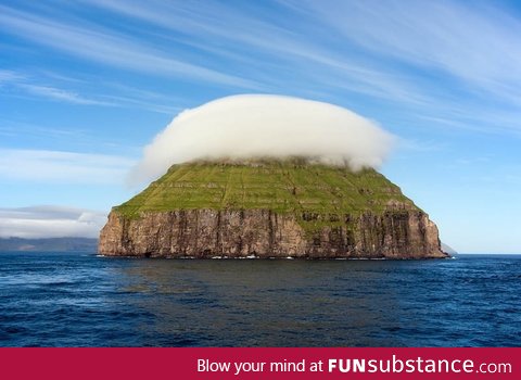 The cloud covered island of Litla Dimun