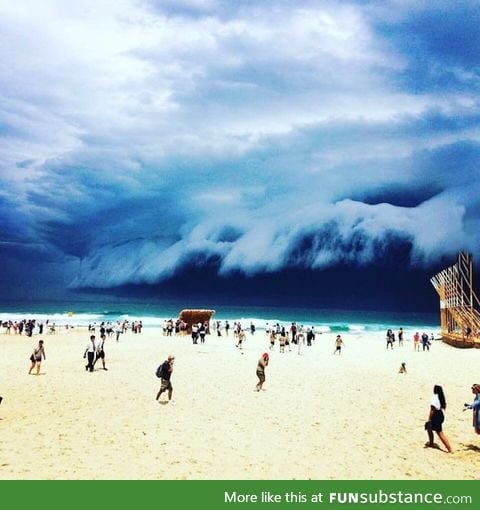 These clouds look like a giant wave about to wipe out the beach