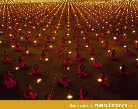 Countless monks in prayer for a better world